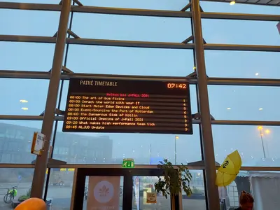 Photo of timetable with my talk on it